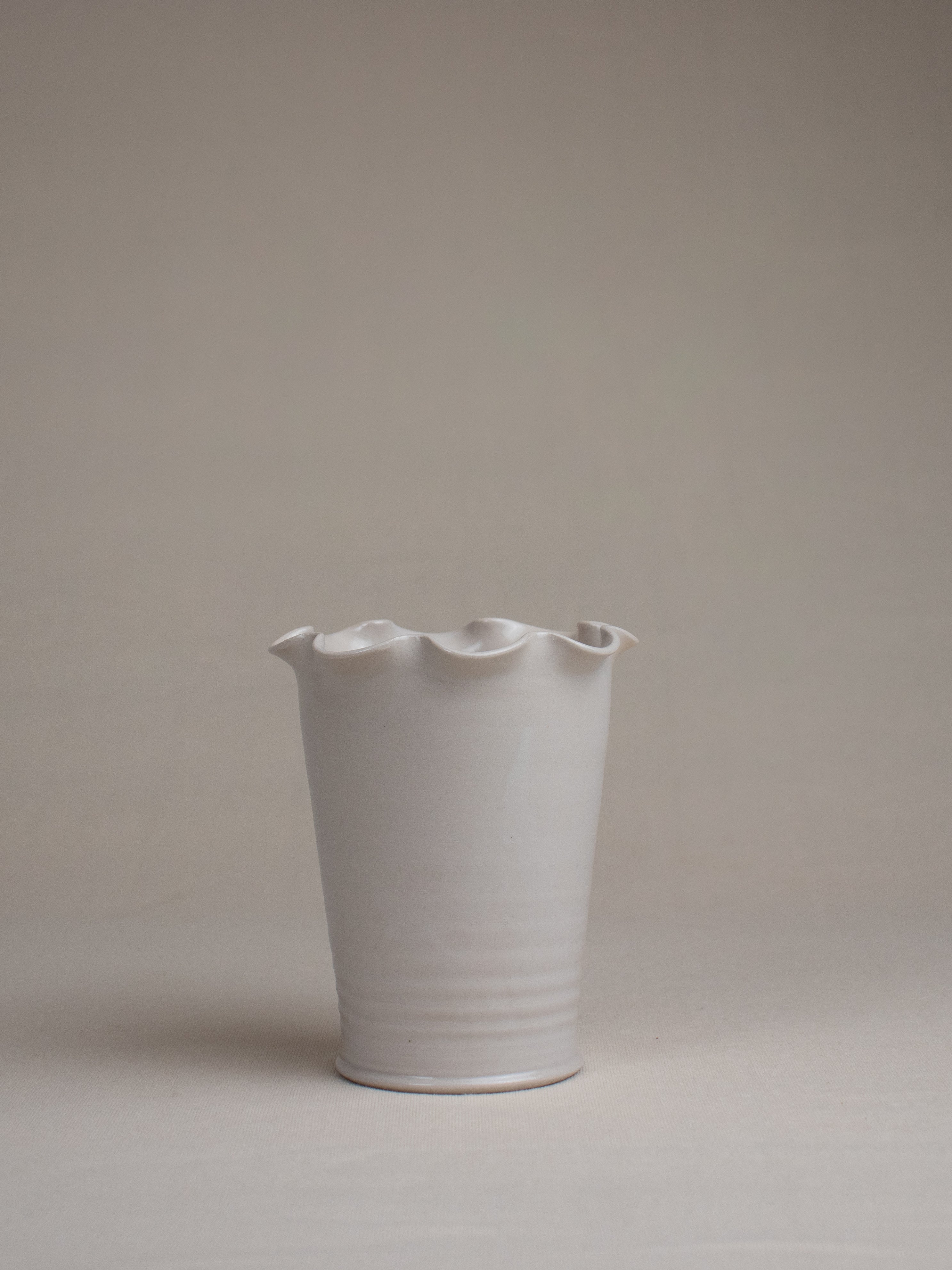 Frilly handmade stoneware pottery vase for flowers or decoration