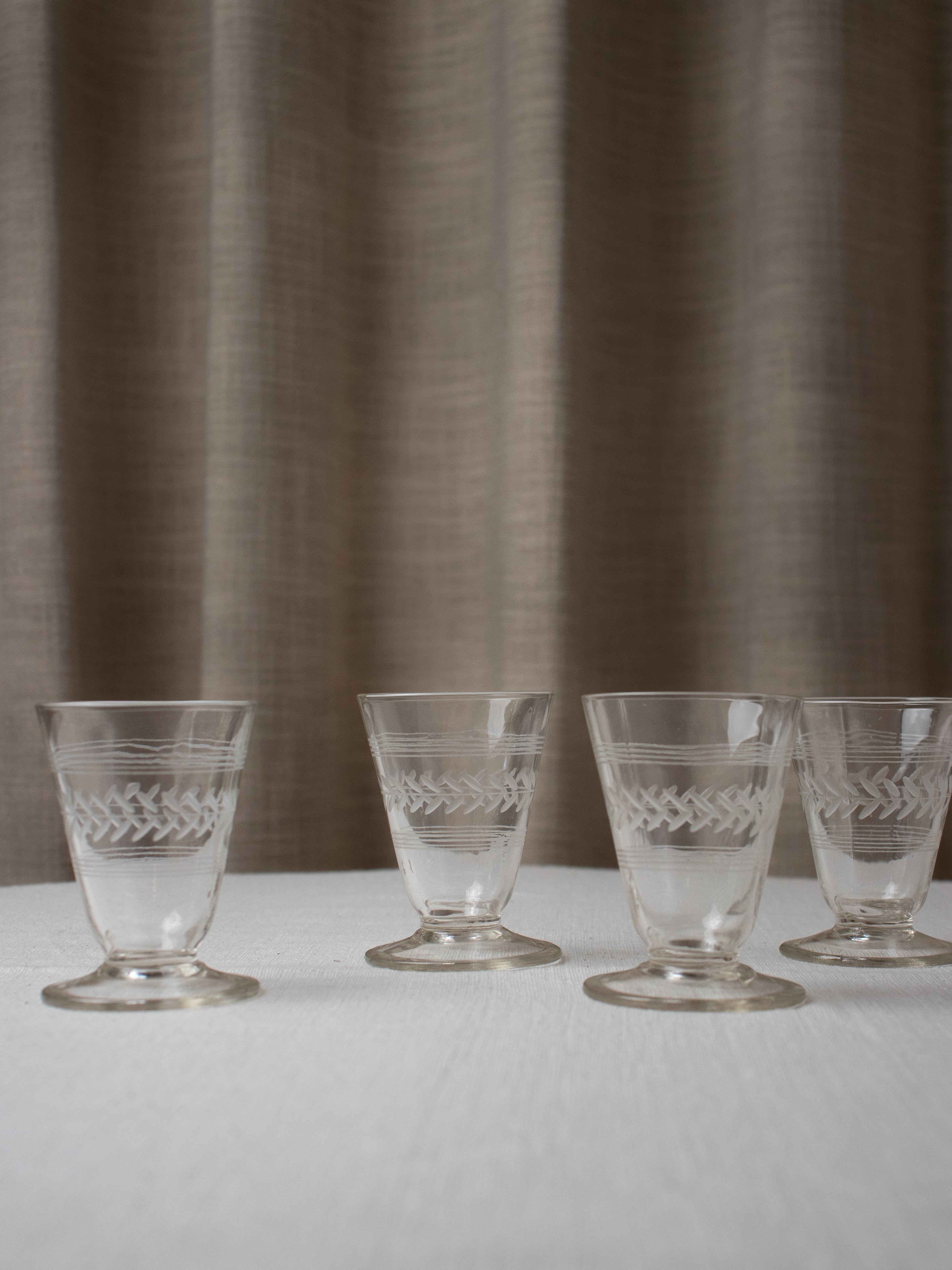 Set of 4 vintage footed etched glasses